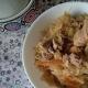 Braised sauerkraut with meat in a slow cooker Sauerkraut stewed with pork in a slow cooker